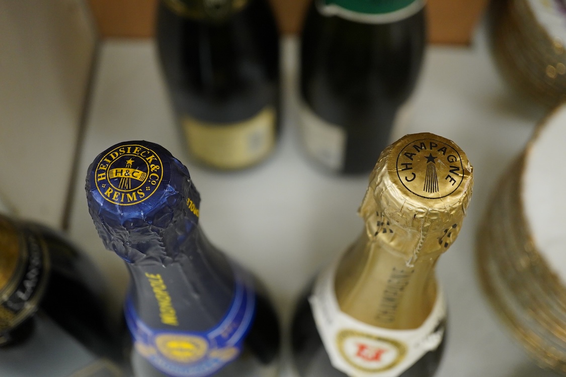 Six various bottles of Champagne to include Monopole, Lanson Black Label and G H Martel & Co